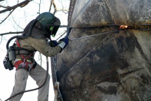 Crew member cutting